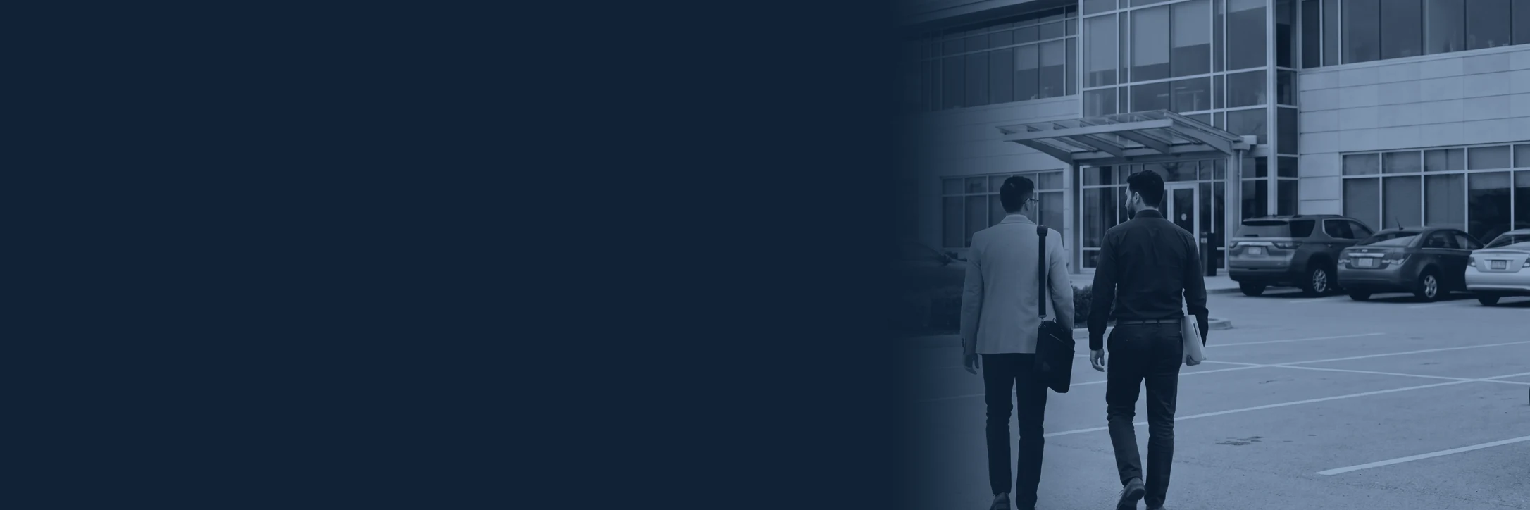 Compliance professionals walking toward a workplace