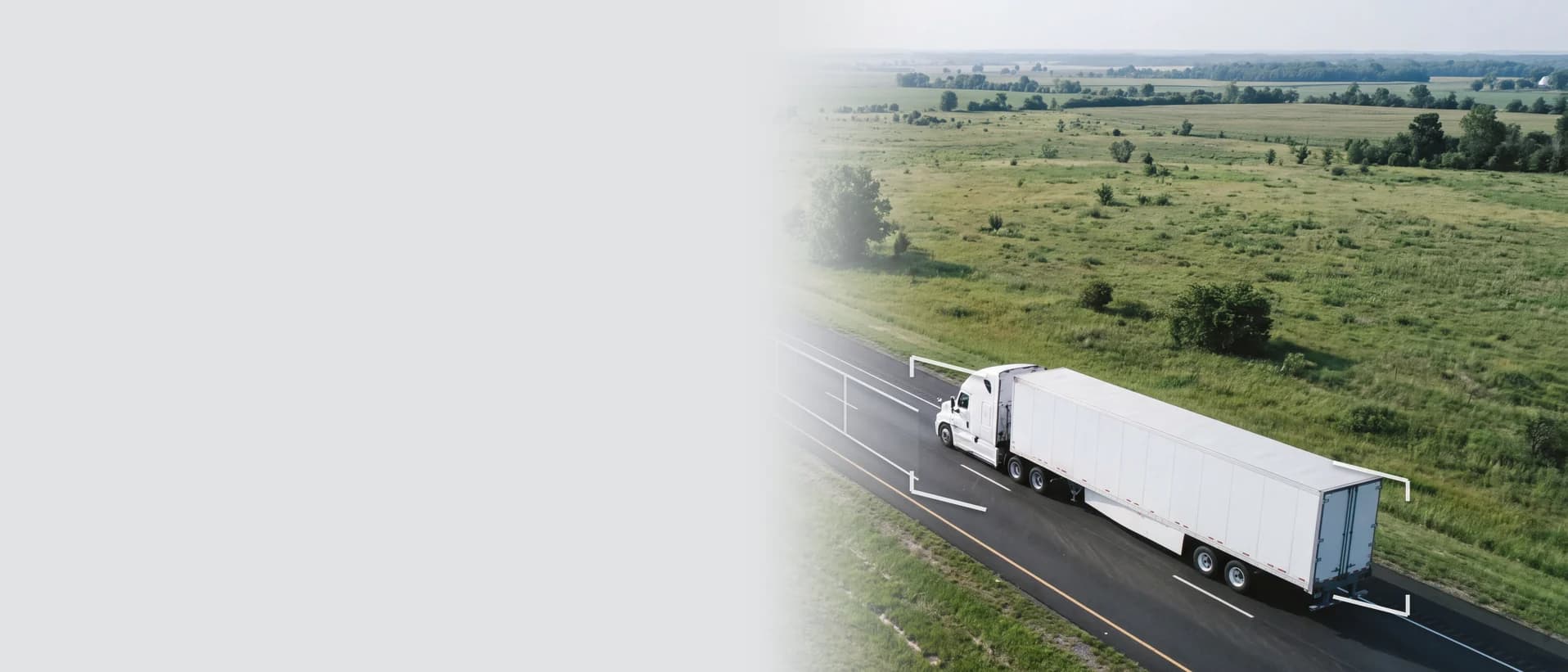 Commercial truck traveling on a rural highway